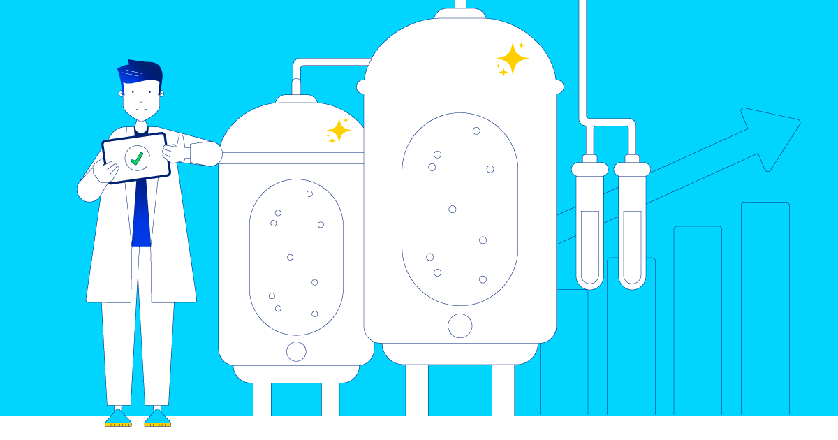 Technician with tablet in front of clean bioreactors, representing cleaning validation in pharma and compliance with FDA cleaning validation guidelines